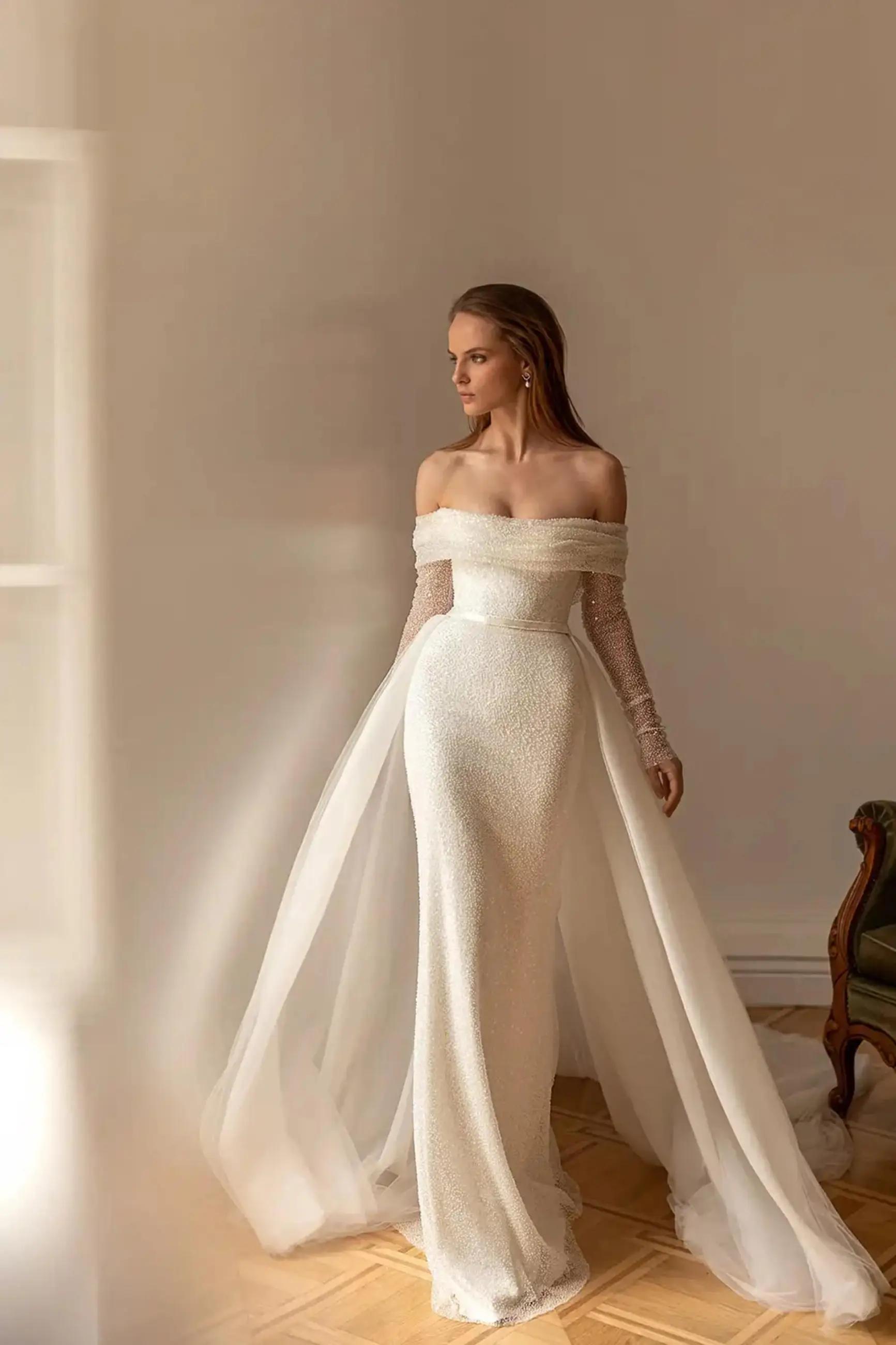 5 Elegant Long-Sleeve Wedding Dresses Perfect for Winter Nuptials Image